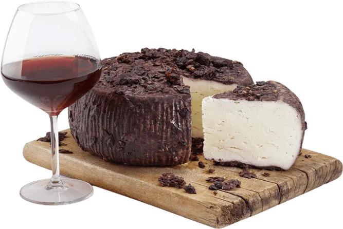 Sicilian cheese aged in wine, served on a wooden board
